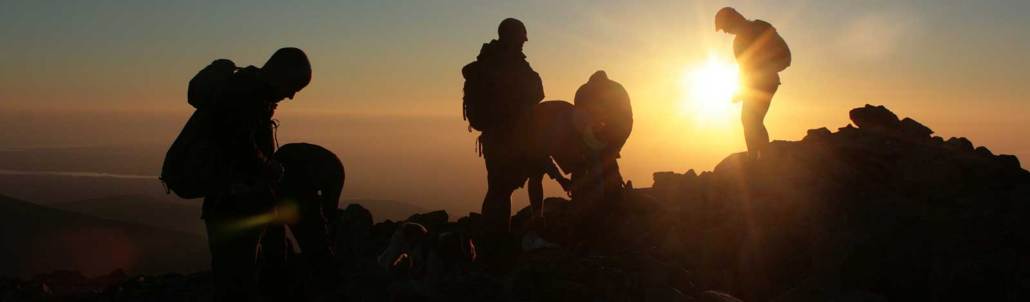 On the summit of Carnedd Llewellyn on the Welsh 3000s Challenge Image showing team on the summit of Carnedd Llewellyn on the Welsh 3000s Challenge