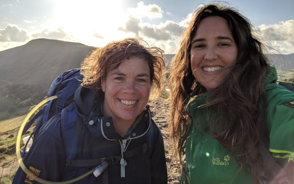 The faces of two happy walkers on the Great Ridge in the Peak District