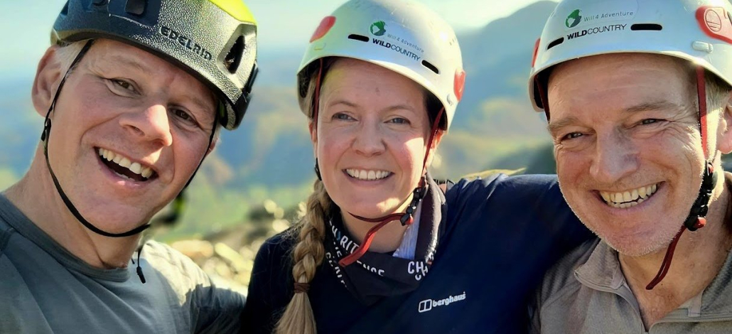 image showing three happy scramblers at the top of Jakes Rake in the Lake District