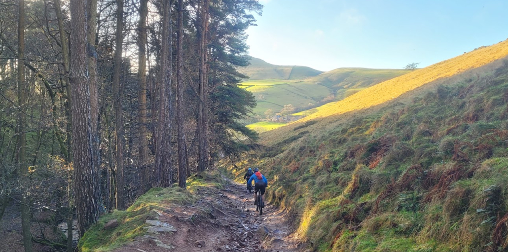 Mountain Bike Riding Macclesfield Forest Classic Two mountain bikers descend a rocky trail in the Peak District near Macclesfield Forest