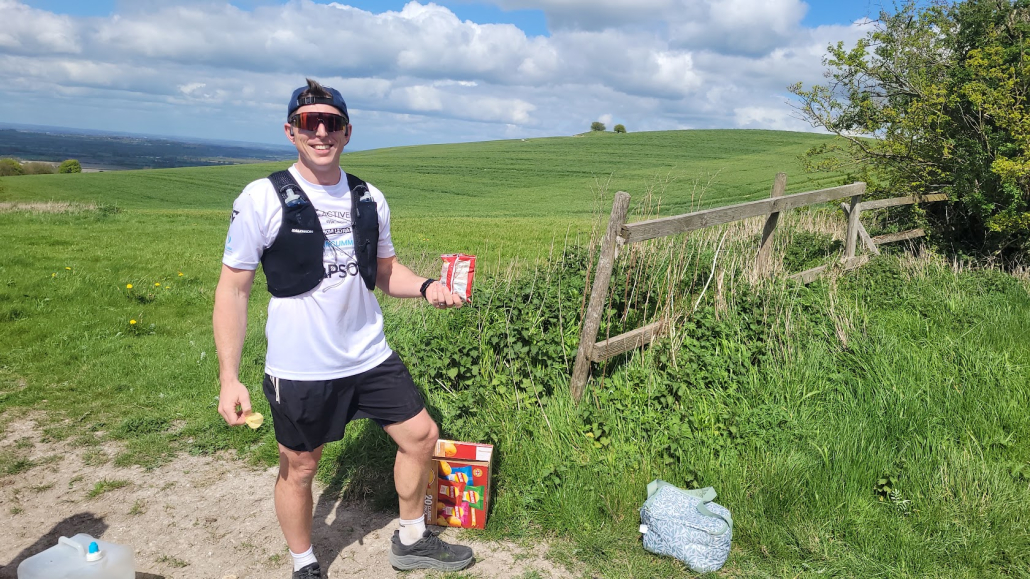 A runner takes a break on a charity event on the Ridgeway in Oxfordshire